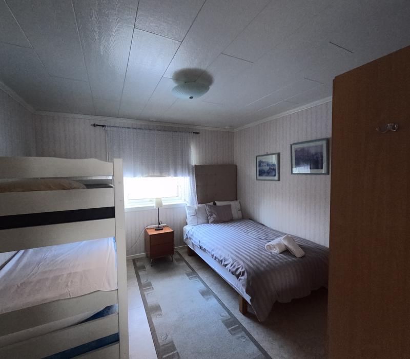 Second bedroom with double bed and bunk bed